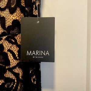 Black lace jumpsuit size 12 tag on